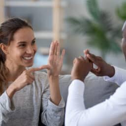 Couple with hearing loss communicate with each other